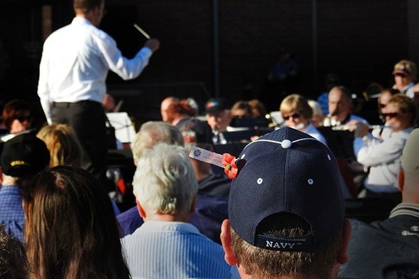 Red River Valley Veterans Concert Band director performing and Navy hat